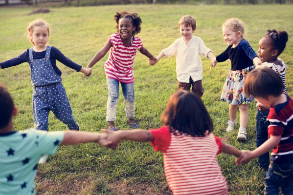 Group of Children Playing at the Field